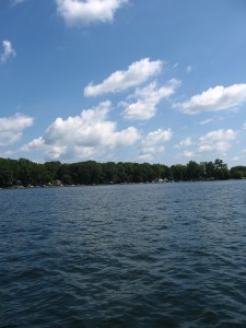 lake, trees, sky with clouds (by Zach Bardon)