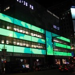 These are a bunch of giant LCD screens that light up the whole block! I caught it right when the world was scrolling past.